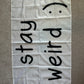 "Stay Weird" Wall Flags (Black or White)