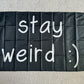 "Stay Weird" Wall Flags (Black or White)